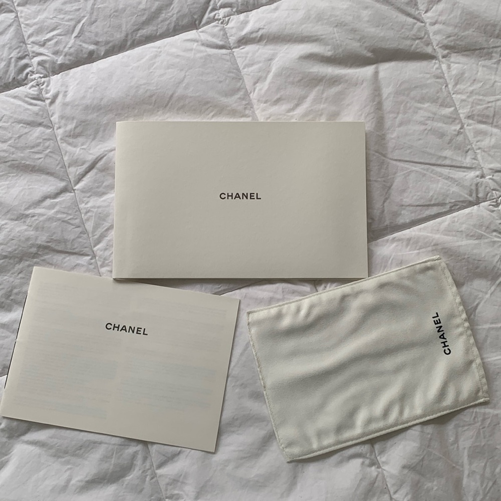 Chanel care book and pouch